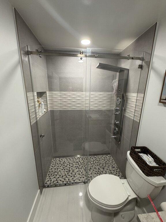 Espino Shower Doors Solutions LLC
