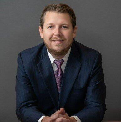 Merrill Lynch Financial Advisor Benjamin Smiles