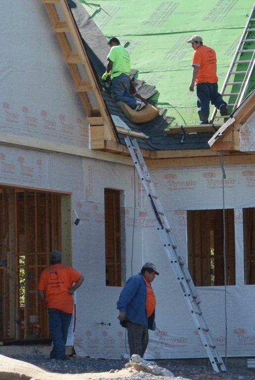 New Design Roofing Inc