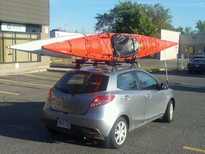 Two Sea Kayaks on a Mazda 2