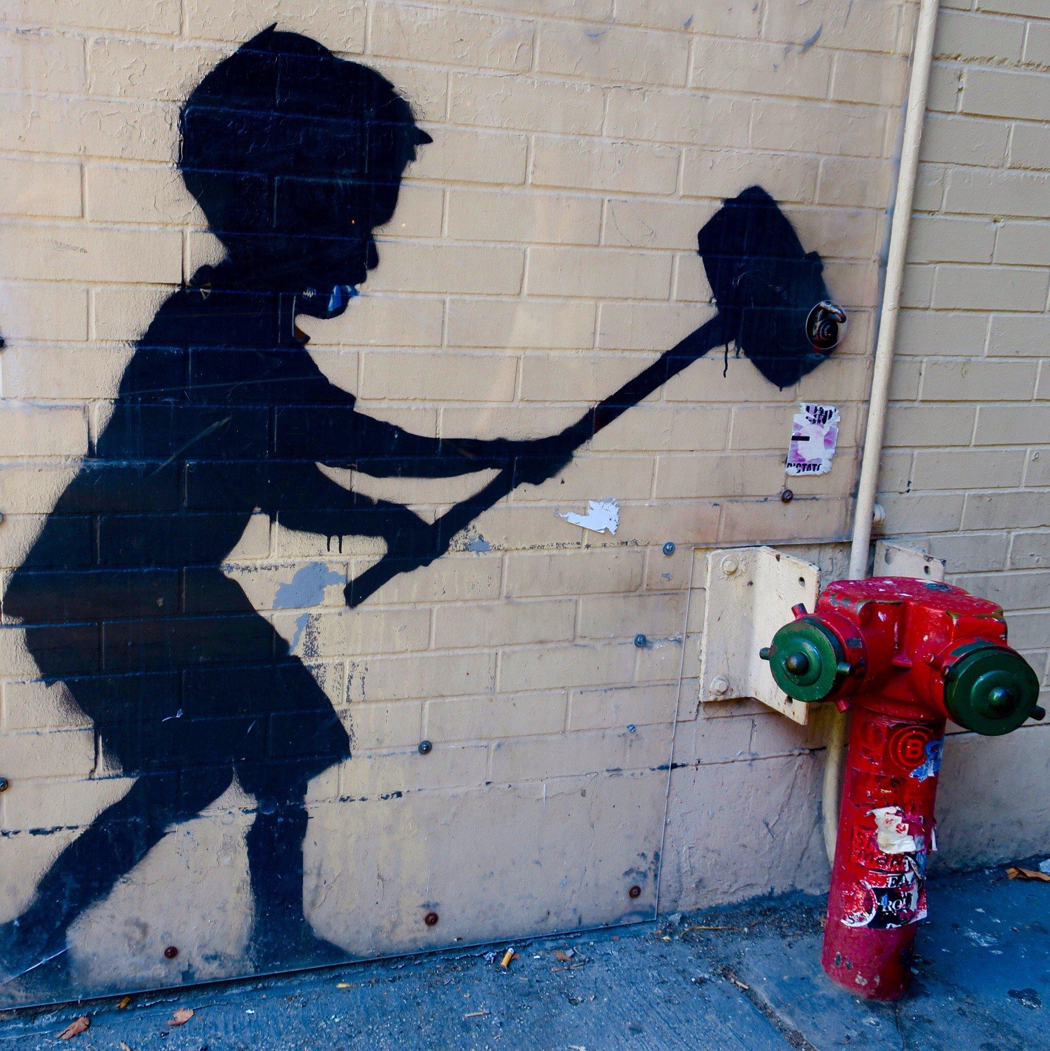 Banksy's "Hammer Boy"