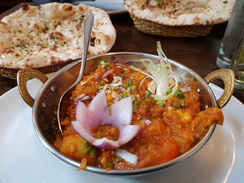 Razas Pizza and Curry House