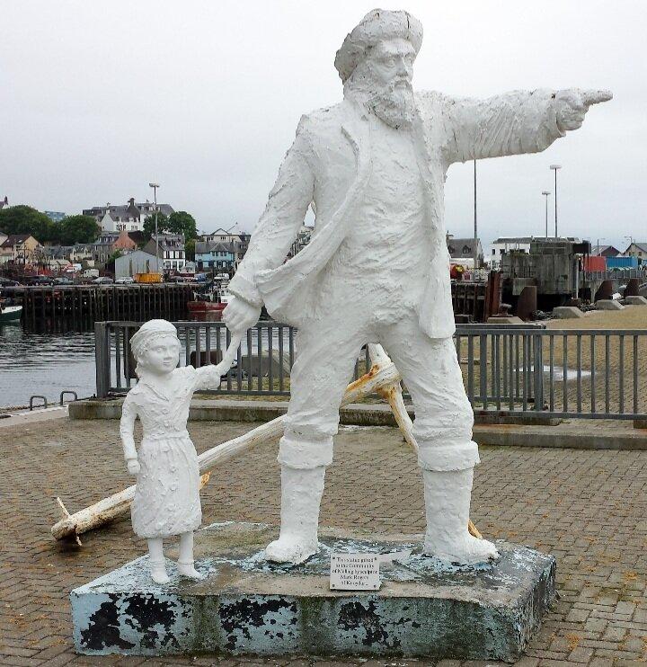 The Fisherman And Child Statue