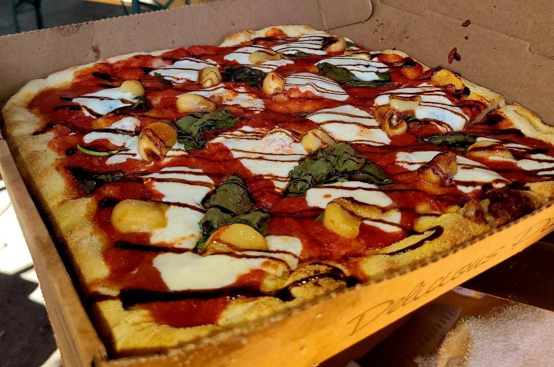 Flo Bros. Fire Smoked Pizza