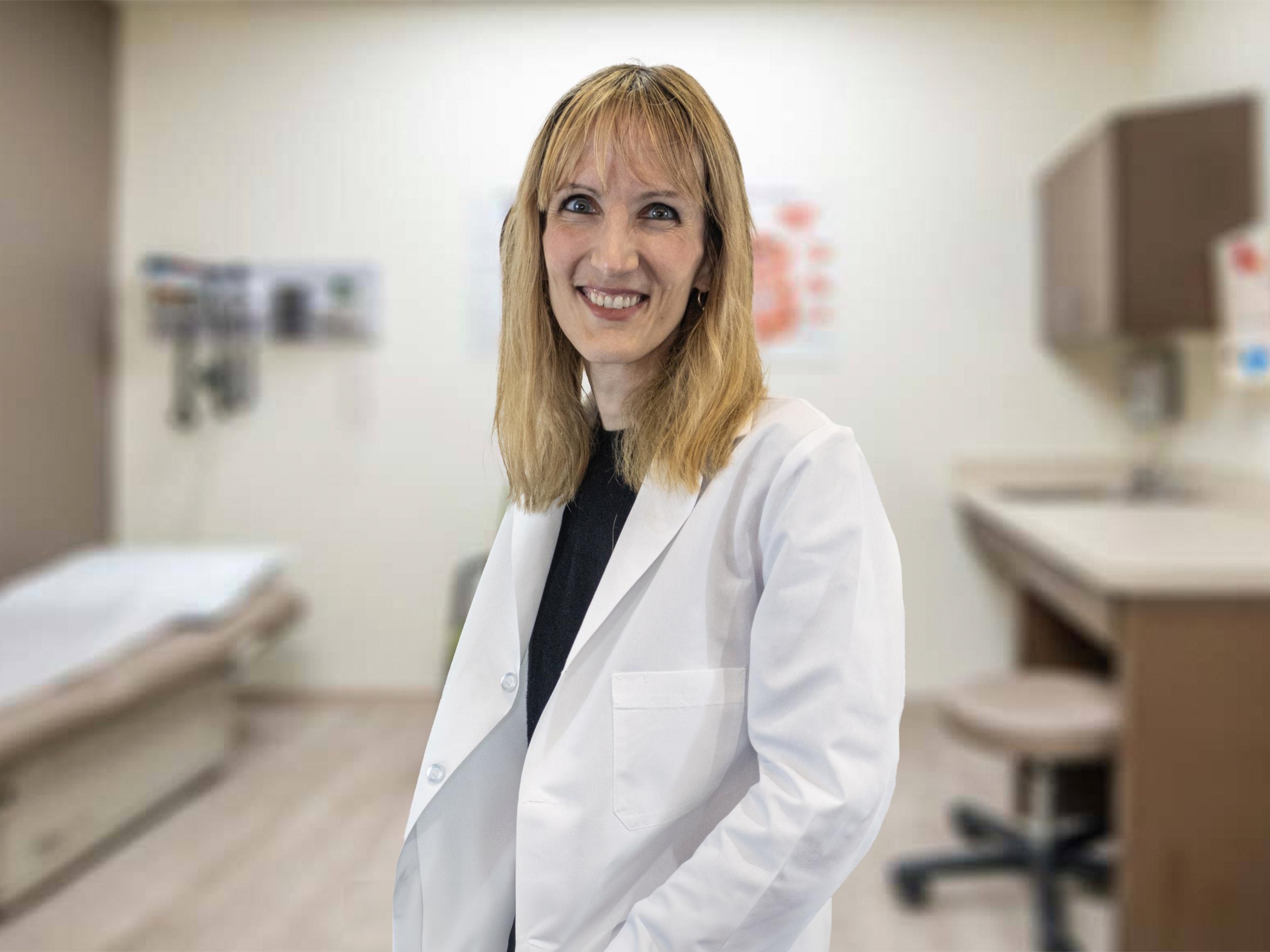 Paige E. Scholer, MD