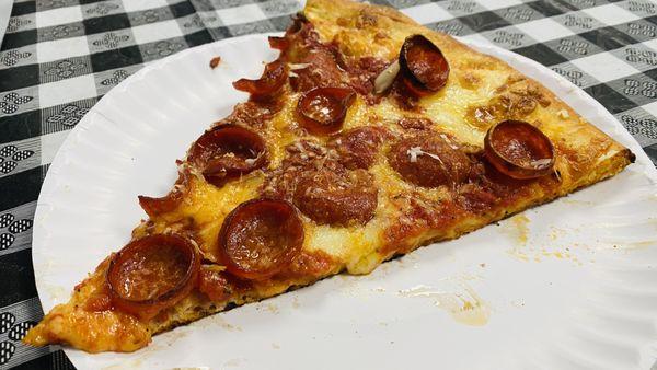 Crispy Pepperoni Pizza Slice.
