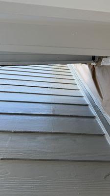 Water from the damaged gutter