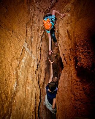 Some slot canyons require teamwork.