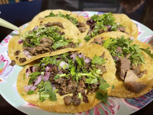 2 steak (right) and 3 lengua (left) tacos