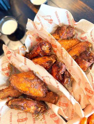 12 piece combo wings: cajun, Thai sweet chili, & lemon pepper (top)