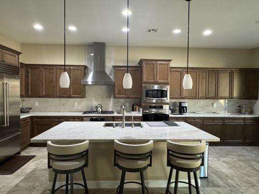 New Quartzsite counters & backsplash, new range hood, new lights & new sink. Quality work!