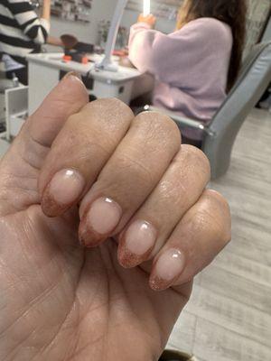 Almond shape nails with a deep French gel polish