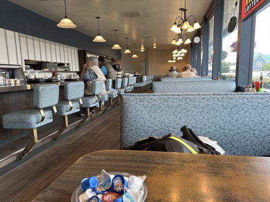 Coffee shop area. There is also A dining room.