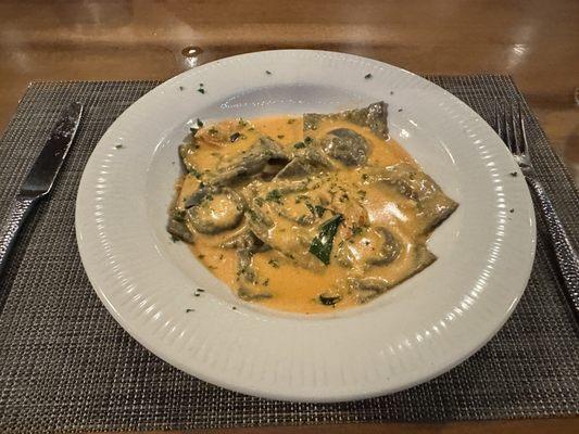 Crab meat filled black ink ravioli with vodka sauce