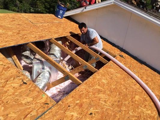 Blown in attic insulation is a great upgrade to your re roof! Especially in hard to reach spots.