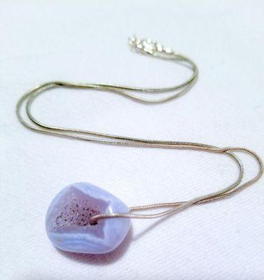 Blue lace agate with a sparkling geode center. I get so many compliments on this!