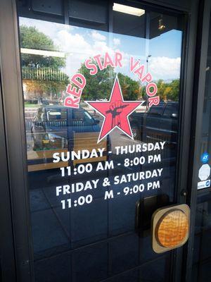 Door with store hours