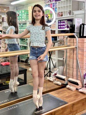 Dancer with new pointe shoes.