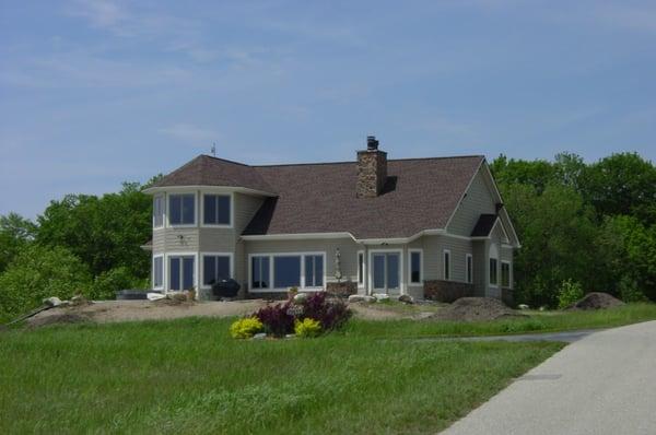 We framed, sided and then roofed this new home overlooking Lake Charlevoix
