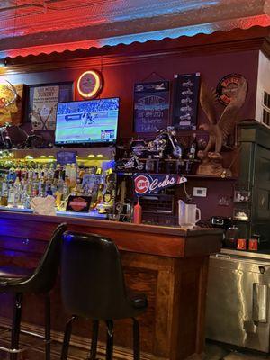 Bar area . Sports playing on various tvs