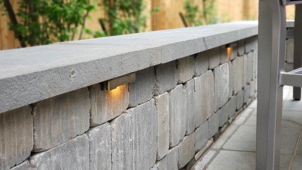 seat wall with outdoor lighting