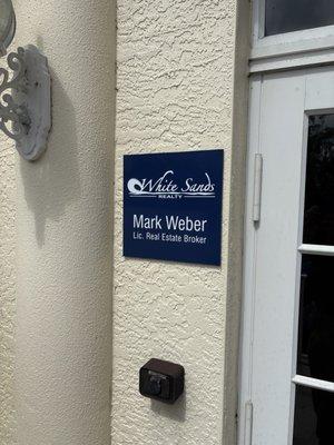 White Sands Realty front Entry Outside office door.
