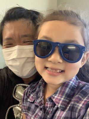 Formerly scared patient just finished with first visit at Kids Dental Care- all smiles here!