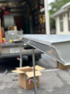 Seamless gutter built on site