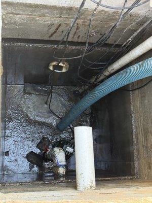 Pumping out our waste basin