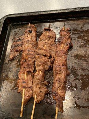 Thin sliced tenderloins marinated in Peach Bourbon BBQ sauce. The apple ginger bbq sauce is also banging.