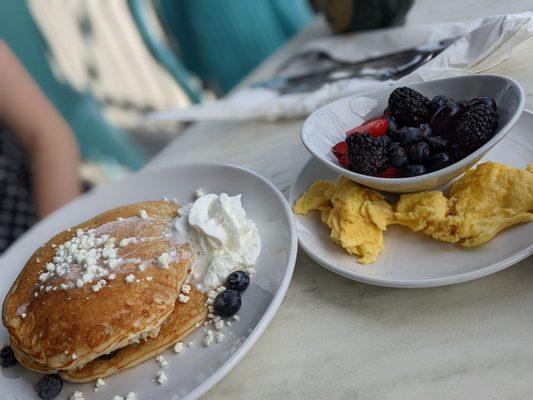 Lemon Blueberry Goat Cheese Pancake with a side of Fresh Fruits and Scrambled Eggs