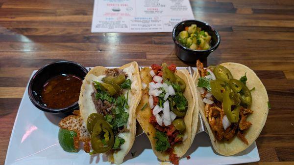 Al pastor, chorizo, and birria tacos