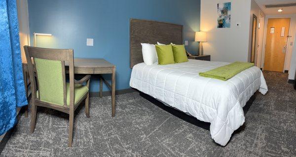 Our Queen Room offers comfort and convenience in a standard-sized space, perfect for solo travelers or couples. Featuring one queen bed, thi