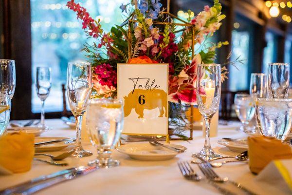 Table number and centerpiece by Heart for Hospitality