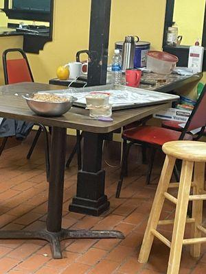 Table with raw food being prepared