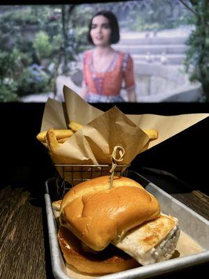 Snow White. Cool movie theatre with food & drinks delivered to your seat. Movie tickets = $13.78. Food = $$$.