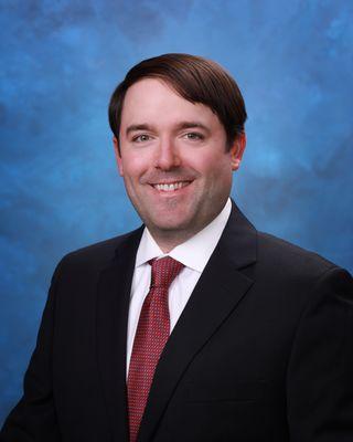 Dr. William J Carroll