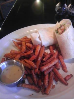 Grilled blackened shrimp wrap with sweet potato fries and a Maple ranch dressing