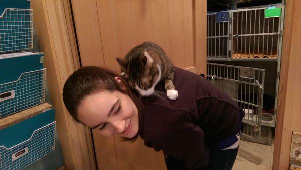 Jessica giving piggy back rides to Cozy Cat guests