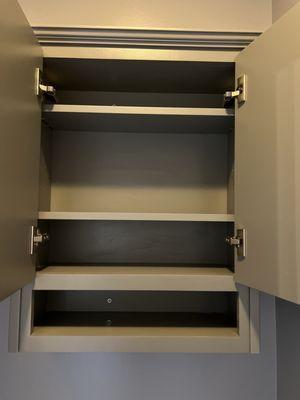 Screw in open shelf and hand painted not their factory marine grade I supposedly paid for