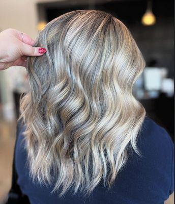 Gorgeos blonde hair with waves.