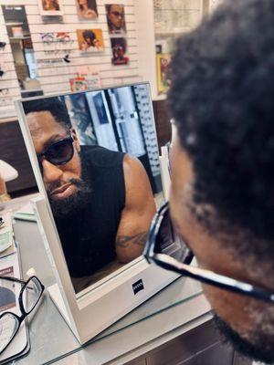 Picking out a new pair of glasses, always a fun experience at Eyelusions!