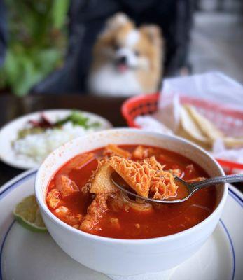 Large Menudo w/ pata, hominy, and choice of corn or flour tortillas | $16
