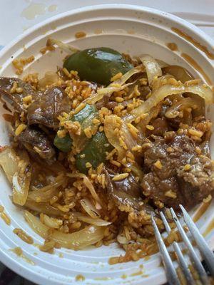 Pepper steak and onions. Tender steak with rice and no flavor.
