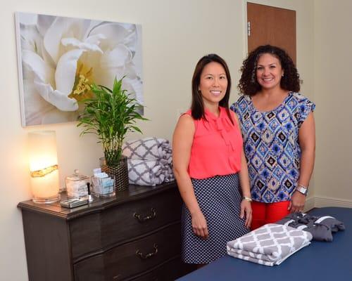 Dr. Lynn Le and Floribel (medical assistant) in an acupuncture treatment room.