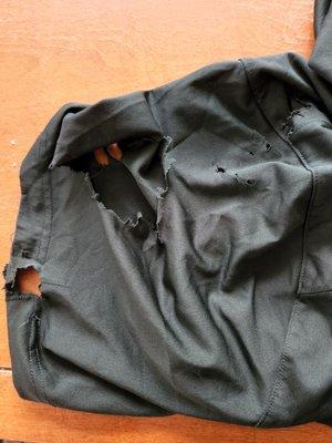 This is my work shirt that was damaged by the washer and or dryer.