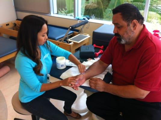 Aide Jan working with patient