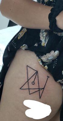 The first tattoo I got, a sigil I made.