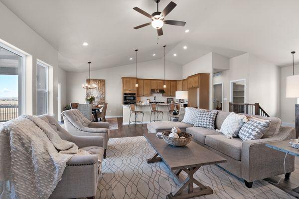 Looking From the Great Room At the Fireplace Into the Kitchen. Open Space And High Ceilings