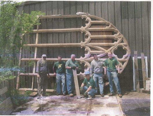 Traverse City field crew in front of 16' tall church window, 2006